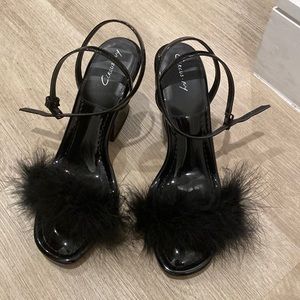 Black heels with feather detail